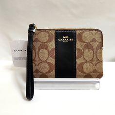 Coach Signature Leather Black And Khaki Wristlet. Top Zipper Closure With Interior Slip Pockets. Please See All Pictures That Include Measurements Coach, Wristlet, Coach Wristlet, Leather Wristlet, Small Wristlet, Coach Signature, Coach Clutch With Zipper For Daily Use, Coach Clutch With Zipper Closure, Black Rectangular Wristlet With Zipper Closure, Coach Rectangular Clutch With Zipper Closure, Black Rectangular Leather Wristlet, Classic Clutch Wristlet With Zipper, Classic Clutch Wristlet With Zipper Closure, Chic Coach Wristlet With Zipper Closure, Classic Wristlet Clutch With Zipper Closure