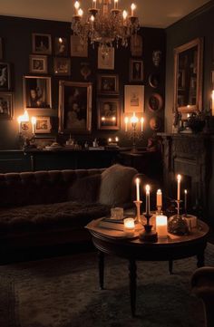 a living room filled with furniture and lit candles in the middle of it's walls