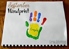 a handprint is displayed on a piece of paper that says, september handprint crayola