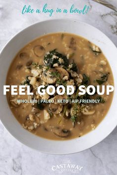 a white bowl filled with soup on top of a table