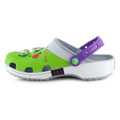 Gear up with the Crocs Buzz Lightyear Classic clog to take your style to infinity and beyond. Crafted with a molded Croslite foam construction featuring Buzz Lightyear Space Ranger-inspired designs on an easy-to-clean upper. This lightweight clog is more than just another slip-on with a roomy feel, Iconic Crocs Comfort, and breathable ventilation holes throughout the upper make this shoe perfect for laid-back days and out-of-this-world comfort. molded Croslite foam construction odor-resistant, easy-to-clean, and quick-drying synthetic upper Buzz Lightyear Space Ranger inspired upper design exclusive Buzz-themed Jibbitz charms ventilation holes provide breathability pivoted heel strap for a secure fit iconic Crocs Comfort footbed for all-day comfort lightweight, non-marking traction outsole Synthetic Clogs With Rubber Sole, Green Synthetic Clogs With Cushioned Footbed, Green Slip-on Synthetic Clogs, Green Synthetic Slip-on Clogs, Green Closed Toe Synthetic Clogs, Green Synthetic Closed Toe Clogs, Green Non-slip Synthetic Clogs, Themed Crocs, Space Ranger