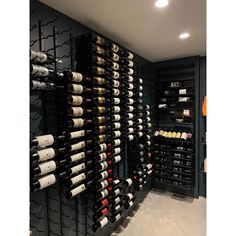 a wine cellar filled with lots of bottles