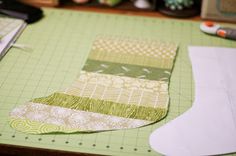 a piece of fabric sitting on top of a cutting board