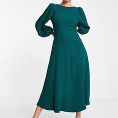 This Dress Is Hunter Green , High Neck, Puff Sleeves, Tie Back, And A Regular Fit. Pictures Of The Dress Is On The Model Shown. The Measurements Are 16 Inches Pit To Pit, 51 Inches In Length, And The Sleeves Are 23 1/2 Inches. The Dress Retails For $172.00. Take A Moment To Browse My Designer Clothes, Shoes, And Pocketbooks. Thank You And Have A Great Day. Fitted Lantern Sleeve Dresses For Work, Green Fitted Puff Sleeve Midi Dress, Fitted Green Midi Puff Sleeve Dress, Fitted Green Maxi Dress With Gathered Sleeves, Elegant Green Puff Sleeve Dress For Brunch, Green Bishop Sleeve Dresses For Fall, Green Bishop Sleeve Dress For Fall, Fitted Green Midi Dress With Gathered Sleeves, Green Workwear Dress With Pleated Sleeves