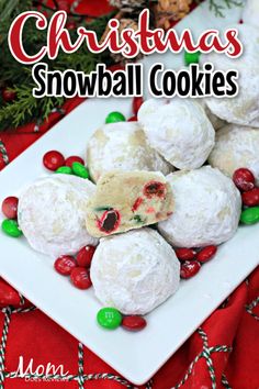 christmas snowball cookies on a plate with candy