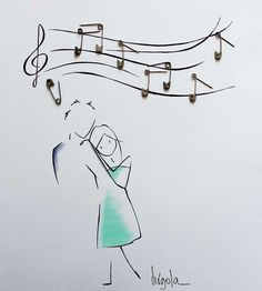 a drawing of a person holding a child in front of musical notes on a wall