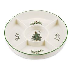 a white plate with green trim and a christmas tree on it