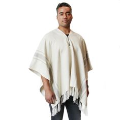 DESCRIPTIONColombian-inspired unisex black and white poncho hand-loomed of Peruvian alpaca with a hand-stitched placket of zigzag detail at neck. Style with blue, white or black denim and a white tee. Unisex poncho or him or her. SIZE45” x 33.5” including tasselsCONTENTSBody: 100% Baby Alpaca CARESpot clean mild soap or dry clean ORIGINHandwoven in Peru Traditional White Poncho For Fall, Casual White Poncho Shawl, Casual White Shawl Poncho, Peruvian Alpaca, White Poncho, Alpaca Poncho, Alpaca Scarf, Baby Alpaca, Hand Loom