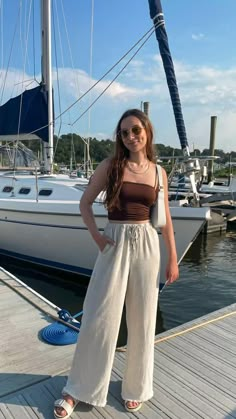 11 Best & Aesthetic Travel Outfits For Women | All seasons Comfy Travel Outfit Ideas Japan Fashion Summer, Japanese Summer Fashion, Causal Summer Outfits, Linen Pants Outfit Summer, Flowy Summer Pants, Flowy Pants Outfit, White Linen Pants Outfit, Goa Outfits, Pants Outfit Summer