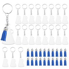 a bunch of key chains with tassels on them