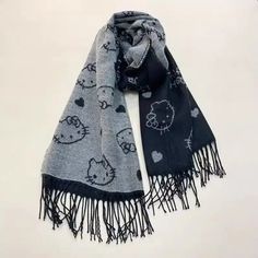 Stay warm and stylish this winter with the Hello Kitty Winter Scarf, featuring the iconic charm of Hello Kitty. Made with soft, high-quality fabric, this scarf is perfect for keeping cozy on chilly days while adding a playful touch to your outfit. Whether you’re out and about or relaxing at home, Hello Kitty has you covered in adorable style. (≧◡≦)💕 Winter Wrap, Cozy Accessories, Grey Color Scheme, Lightweight Scarf, Cartoon Cute, Kawaii Fashion, Autumn And Winter, Winter Scarf