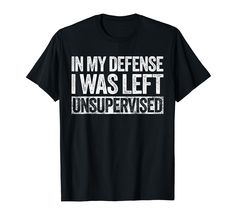 a black t - shirt that says in my defense i was left unsuppressed