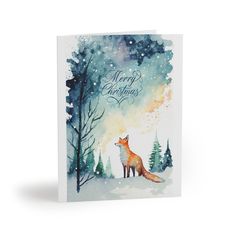 a christmas card with an image of a fox in the snow and pine trees on it