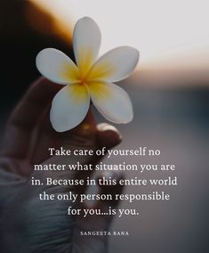 someone holding a flower in their hand with the quote take care of yourself no matter what situation you are