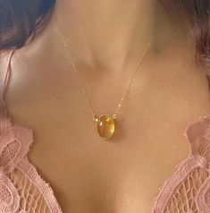 Beautiful AAA Large Citrine Oval Necklaces. 24k gold plated around the edges of the pendant so you can soak in the citrine energy through your skin Choose from 16 or 18 length! Chains are gold fill. Citrine attracts wealth, prosperity and success. It imparts joy, wonder, delight and enthusiasm. Raises self-esteem and self-confidence. Stimulates the brain, strengthening the intellect. Citrine promotes motivation, activates creativity and encourages self-expression Citrine Crystal Necklace, Full Moon Necklace, Gold Moon Necklace, Brown Gemstone, Citrine Jewelry, Oval Necklace, Citrine Pendant, Citrine Necklace, Jewel Necklace