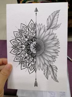 a drawing of a sunflower with arrows on it