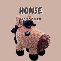 a stuffed animal that has the words horse on it's face and is made out of knitted material