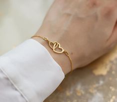 Gold Interlocking Heart Bracelet, Infinity Love Bracelet, Girlfriend Gift, Mum Birthday Gift, 24k Gold Vermeil, Gift For Her A stunning piece of jewelry in a beautiful box. The bracelet features interlocking heart charm & a beautiful pearl heart at the end of the extension chain.  f e a t u r e s ∙ interlocking hearts symbolising infinite love  ∙ 24ct gold vermeil (with 925 sterling silver base) ∙ add a complimentary gift message for free ∙ minimal design ∙ nickel free ∙ adjustable size (7" - 8. Interlocking Hearts, Mum Birthday Gift, Infinity Love, Pearl Heart, Mum Birthday, Love Bracelet, Girlfriend Gift, Beautiful Heart, Love Bracelets