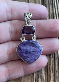 "Charoite & Amethyst Sterling Silver Pendant 1-3=4\" L by 7/8\" W Charoite was mined in Siberia and is 19x20mm. Amethyst is 7x11mm. 7.9g Sterling Silver, stamped 925 *Check out my shop for one of a kind, handmade pieces that feature genuine gemstones and Sterling Silver. I love to work with unique rare gems especially those mined in the US to support American Miners. I personally hand pick each and every single stone used in my designs. *I have been in the jewelry business for over twenty years Purple Multi-stone Pendant Gemstones, Purple Multi-stone Gemstones For Gift, Unique Handmade Purple Gemstones, Unique Purple Gemstones For Jewelry Making, Purple Gems, Natural Stone Jewelry, Rare Gems, Single Stone, Jewelry Business