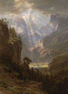 a painting of mountains and trees in the foreground, with sunlight coming through clouds