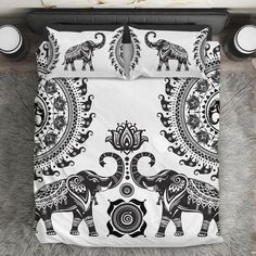 an elephant bedding set with black and white designs