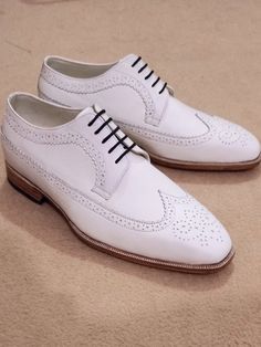 Luxury handcrafted leather shoes crafted with premium quality leather. All inner and outer parts including sole made of genuine leather. Every item we produce has a piece our love, our soul. To find out your exact US size, take a look at our size chart. We are offering free shipping World-wide to all our valued customers. Please note, We make - Made to Order handcrafted leather shoes and it will take 2 to 3 weeks to complete. We ship our products using FedEx / DHL Express and typically it takes 5 to 7 business days to deliver World-wide. There may be a slight variation in color due to photography light effects and computer color resolution but colors will be used matching the originals. Please feel free to get in touch if there is any query about the product. Our team will be delighted to Elegant White Wingtip Lace-up Shoes, Leather Wedding Shoes For Semi-formal Occasions, Oxford Dress Shoes With Brogue Detailing For Wedding, White Plain Toe Lace-up Business Shoes, Wingtip Brogue Leather Shoes For Wedding, Wingtip Leather Shoes With Brogue Detailing For Wedding, Leather Oxfords For Groom With Round Toe, Almond Toe Brogue Wedding Dress Shoes, Wedding Cap Toe Leather Shoes With Brogue Detailing