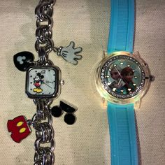 2 Disney Accutime Watches: Disney Mickey Quartz Analog Charm Bracelet Pearl Face Watch Bracelet & Frozen Anna & Elsa Blue Flashing Watch. Both Watches Have Brand New Batteries Installed On 5/25/23. Frozen Watch Has 3 New Batteries. No Original Boxes Are Available With These Watches. There Are 4 Charms On The Mickey Silver Tone Bracelet Square Pearlized Face Watch. Both Fit Up To 8.5” Wrist. The Frozen Watch Is Considered Childs But An Adult Could Wear It. It Flashes In Different Colors & The Hea Blue Watches With Bracelet Strap As Gift, Charm Bracelet Watch, Disney Watches, Frozen Anna, Anna Elsa, Bracelet Pearl, Anna Frozen, Watch Bracelet, Elsa Anna