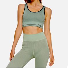 Seamless Sports Bra And Leggings Is A Mid-Impact Pick Designed With Ribbed Finish. Mid-Impact Sports Bra And Leggings Scoop Neckline; Pullover Styling Seamless Machine Washable Nylon/Spandex Top Is Xs Bottoms Are Small Color Is Like An Army Sage Green With Black Trim Selling As A Set Sage Green With Black, Sports Bra And Leggings, Spandex Top, Seamless Sports Bra, Leggings Set, Black Trim, Womens Calvin Klein, Scoop Neckline, Pullover Styling