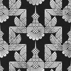 an artistic black and white pattern on fabric