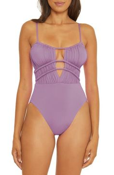 Hit the beach in style with this shirred one-piece swimsuit designed with adjustable front cutouts and an open tie back. Adjustable straps Lined Cheeky back coverage 83% nylon, 17% spandex Hand wash, line dry Imported Plunging One Piece Swimsuit, Bare Beauty, Swimsuit Design, One Piece Swim, Luxe Gifts, Color Code, Woman Colour, Tie Back, Santorini