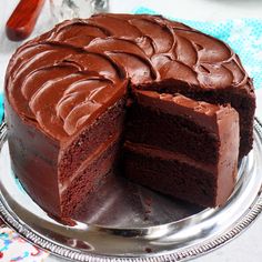 a chocolate cake with one slice cut out