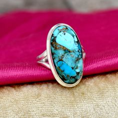 Blue Copper Turquoise Ring 925 Sterling Silver Ring, Handmade Ring, Oval Ring, Turquoise Ring, Split Band Ring Handmade Jewelry Gift For Her *Main Stone : Blue Copper Turquoise *Main Stone Color : Blue *Shape : Baguette *Main Stone Creation : Lab Created Gemstone *Metal : Sterling Silver *Base Metal : 925 parts per 1000 *Style : Ring What Are The Benefits of Silver Jewelry Silver has a long history in antibiotics and sterilization, with many women and men wearing silver jewelry to stave off infe Untreated Oval Turquoise Ring For Anniversary, Silver Bohemian Turquoise Ring Hallmarked, Nickel-free Blue Turquoise Ring Bohemian Style, Blue Multi-stone Turquoise Ring In Sterling Silver, Nickel-free Blue Turquoise Ring In Sterling Silver, Unique Nickel-free Sterling Silver Turquoise Ring, Oval Rings, Handmade Jewelry Gift, Silver Rings Handmade