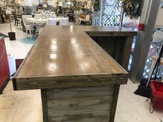 a large wooden counter in a store