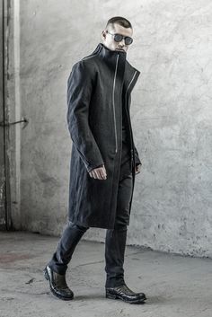 "PHANTOM CHARCOAL WASHED DENIM COAT __SLIM FIT __RAW HEM __ZIPPER CLOSURE __WASHED HEAVY DENIM __2 FRONT POCKETS __1 INTERIOR POCKET __1 REAR POCKET __ARM SHAPED SLEEVES __SCAR STITCHED SLEEVE DETAILS __FULLY LINED model__ chest 103 (40.5\"), waist 77 (30.3\"), hips 96 (37.8\"), biceps 35 (13.8''), height 180 (5'11\"), kg 74 (163 lbs) model wears size M | color: charcoal, black lining fabric__ 100 washed heavy denim, lining: 100 cotton care__ dry clean sizing__ size XS (IT 44, US 34, JP 1) chest Luxury Urban Outerwear In Dark Wash, Modern Fitted Outerwear With Stand Collar, Modern Fitted Outerwear For Streetwear, Fitted Outerwear With Pockets And Stand Collar, Fitted Long Coat Casual Outerwear, Fitted Urban Outerwear For Spring, Fitted Casual Long Coat, Luxury Urban Dark Wash Outerwear, Fitted Outerwear With Stand Collar For Streetwear