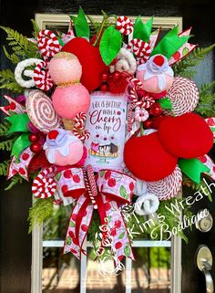 the wreath is decorated with candy and candies