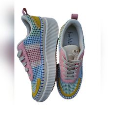 Elevate Your Sneaker Game With These Stylish Nicole Miller Brita Mixed Woven Shoes. These Shoes Feature A Beautiful Pastel Multicolor Woven Fabric And Suede Upper, Accented With Stitching For A Unique Touch. The Low Top Shoe Shaft Style And Pastel Theme Add A Trendy Vibe To Your Outfit. The Shoes Come In Us Size 8. Get These Brand-New Shoes Without The Box And Step Out In Style. Pink Round Toe Platform Sneakers With Laces, Trendy Pink Platform Sneakers With Rubber Sole, Pink Platform Sneakers With Textured Sole, Pink Leather Platform Sneakers With Round Toe, Pink Platform Lace-up Sneakers, Pink Lace-up Sneakers For Summer, Pink High-top Platform Sneakers With Textured Sole, Pink Low-top Platform Sneakers With Rubber Sole, Pink Leather Platform Sneakers With Rubber Sole