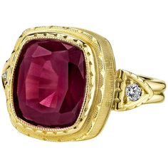 This engraved bezel ring features a 7.56 carat, rich port-wine color rhodolite garnet and sparkling diamonds in a handmade 18k yellow gold design. This setting was custom made for this fine gemstone and shows off the rhodolite's beautiful pinkish red color. Handmade in 18k yellow gold by our Master Jewelers in Los Angeles, this ring has a timeless design and is comfortable to wear. It is a handsome statement ring, yet suitable for everyday wear! Be bold and beautiful! Ring size 7 Complimentary s Bezel Set Cabochon, Bezel Band, Artsy Earrings, Coordinates Jewelry, Rhodolite Garnet Ring, Garnet And Diamond Ring, Mens Band Rings, Pink Stones, Bezel Set Ring