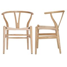 two wooden chairs sitting next to each other