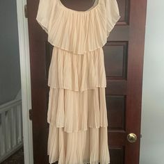 Beautiful Cream Colored Ruffle Tier Dress Hits Just Below The Knee. Wear It Formal With A Heel Or Cute With Wedge Sandal And Denim Jacket. Never Worn. Purchased From Red Dress Boutique For 79.00 Cute Cream Dresses With Ruffles, Feminine Beige Ruffled Dress, Vintage Fashion Cream Dress With Ruffles, Vintage Cream Maxi Dress With Ruffles, Cream V-neck Dress With Ruffle Hem, Tier Dress, Red Dress Women, Tiered Ruffle Dress, Red Dress Boutique