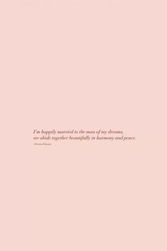 a pink wall with a quote on it that says, i'm happily married to the man in my dreams