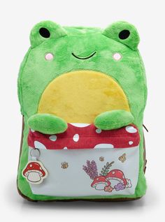 a green backpack with a frog on it