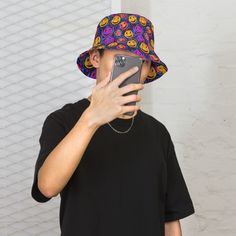 Elevate your festival and outdoor experience with our TrendyTrippy SmileyFace Bucket Hat - the ultimate accessory for those sunny, music-filled days! Perfect for festivals, concerts, raves, and all your outdoor adventures, this hat blends style and functionality effortlessly. Its on-trend design ensures you stand out in the crowd, while the wide brim provides shade and protection from the sun. Lightweight and comfortable, it's an ideal companion for dancing, exploring, or simply soaking up the vibrant atmosphere. Don this hat to make a statement and stay cool in warm weather - because fashion should never compromise on fun! Comes in two different sizes, Small and Large Bucket Hat Designs, Mens Rave Outfits, Music Festival Accessories, Rave Hats, Custom Bucket Hats, Rave Accessories, Outfits Rave, Reversible Bucket Hat, Summer Waves