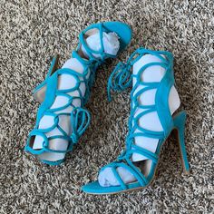 Open Toe Strappy Lace Up High Heel Sandals Brand New With Box Runs True To Size Heel Height: 4 Inches Blue High Heel Lace-up Sandals For Summer, Turquoise Ankle Strap Heels For Summer, Summer Turquoise Ankle Strap Heels, Blue Lace-up Sandals For Party, Blue Round Toe Lace-up Sandals, Blue Strappy Sandals For Party, Blue Strappy Sandals For Spring, Chic Turquoise Open Toe Sandals, Blue Lace-up Sandals For Summer