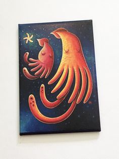 a painting of an orange octopus and a starfish on a white wall with blue background