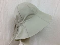 "For more hat sewing patterns visit: https://widebrimlady.etsy.com When buying this hat pattern you get access (instantly) to 2 digital files (PDF). In one, you will find the pattern of the hat, and in the other, the tutorial on how to cut and sew that hat, so you can make your own DIY hat! With this sewing pattern, you will make an adjustable tulip sun hat. This attractive, upscale hat can be adjusted to fit your head perfectly, even with your ponytail! and it is reversible. the nice wide brim offers excellent protection from the sun. This pattern has a 4.5\" brim (11.5 cm) and will fit a head circumference of 22\"- 25\" (56-63 cm). The pattern is for personal use only." Tulip Hat Pattern, Hat Sewing Patterns, Simple Design Clothes, Floppy Bucket Hat, Tulip Hat, Make Your Own Hat, Hat Sewing Pattern, Hat Sewing, Bucket Hat Pattern