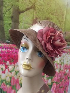 Gorgeous polypropylene hat - these hats are meant for special occasions mostly but it might be suitable for a few casual events as well. Brown hat with 2.75 inch brim with beige satin ribbon - mauve flower and little touches of feathers to add accent. One size fits up to 23.75 inches head circumference. Brown Vintage Straw Hat For Spring, Vintage Brown Straw Hat For Spring, Brown Short Brim Straw Hat For Kentucky Derby, Fitted Brown Boater Hat For Kentucky Derby, Beige Boater Hat For Garden Party, Beige Brimmed Straw Hat For Garden Party, Beige Short Brim Straw Hat For Garden Party, Brown Short Brim Top Hat For Summer, Beige Flat Brim Boater Hat For Garden Party