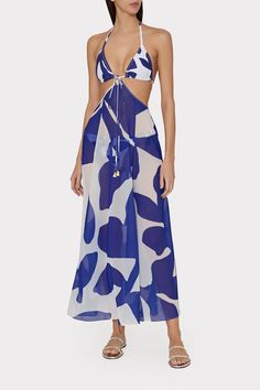 Done in a sheer version of our new-for-spring Grand Foliage print, this versatile cover-up is designed to be worn multiple ways: tied as a halter dress or as a bikini top style. It’s finished with tassel details on the ties. Wear it over its coordinating Grand Foliage print swimwear. Halter Neck Top For Beach Cover-up During Beach Season, Spring Sheer Swimwear For Beach, Sheer Swimwear For Spring Beach Season, Spring Beach Swimwear With Sheer Details, Sheer Swimwear For Spring Beach Outings, Spring Sheer Beachwear Swimwear, Spring Sheer Swimwear For Beach Party, Sheer Summer Swimwear For Spring, Sheer Swimwear For Spring And Summer