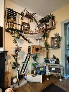 a living room filled with lots of different types of furniture and decorations on the wall