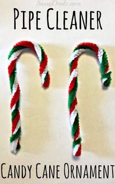 two candy canes are sitting next to each other on a white surface with the words, pipe cleaner candy cane ornament