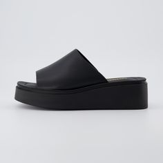 Meet Play, a one-band platform sandal. Play features a soft, vegan leather slide upper, and a memory foam padded insole for extra comfort. Play's flexible platform outsole measures 2 inches high, adding the perfect amount of extra height. Playform Sandals, Black Platform Slides, Black Platform Sandals, Graduation Dresses, Platform Slides, Black Platform, Intj, Sandals For Sale, Leather Slides